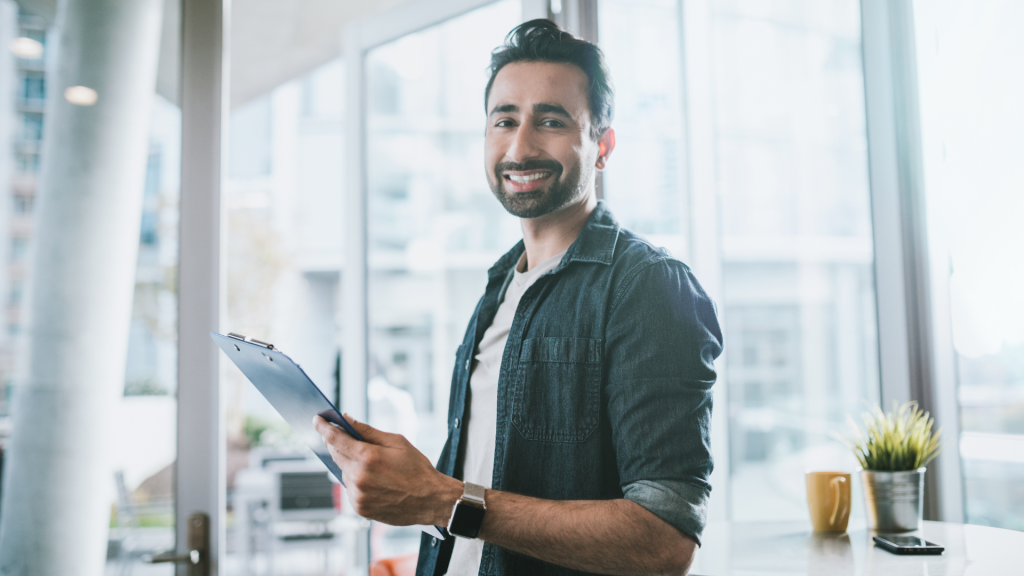 it professional holding a paper